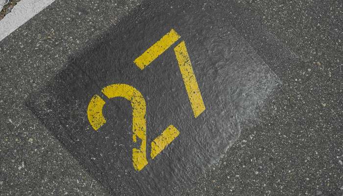 The number 27 on written on street