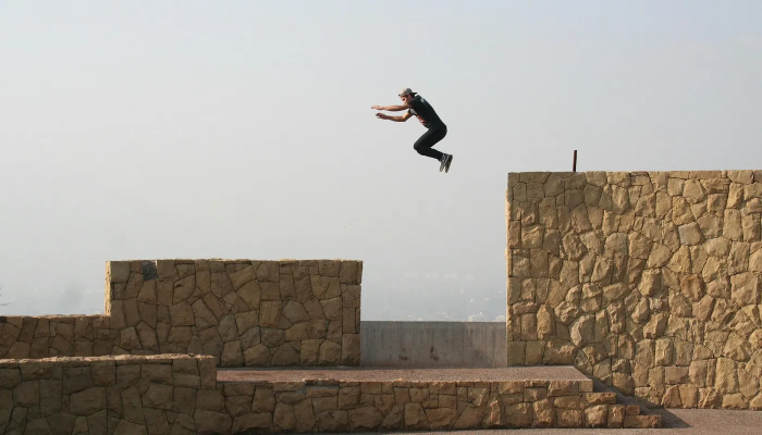 Person jumping forward